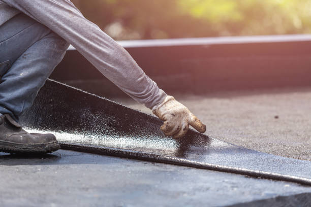 Professional Waterproofing technician working in Washington, KS